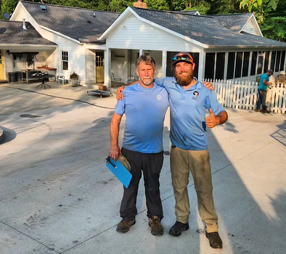 Two arborists from TN Tree Preservation providing professional tree service in Franklin TN